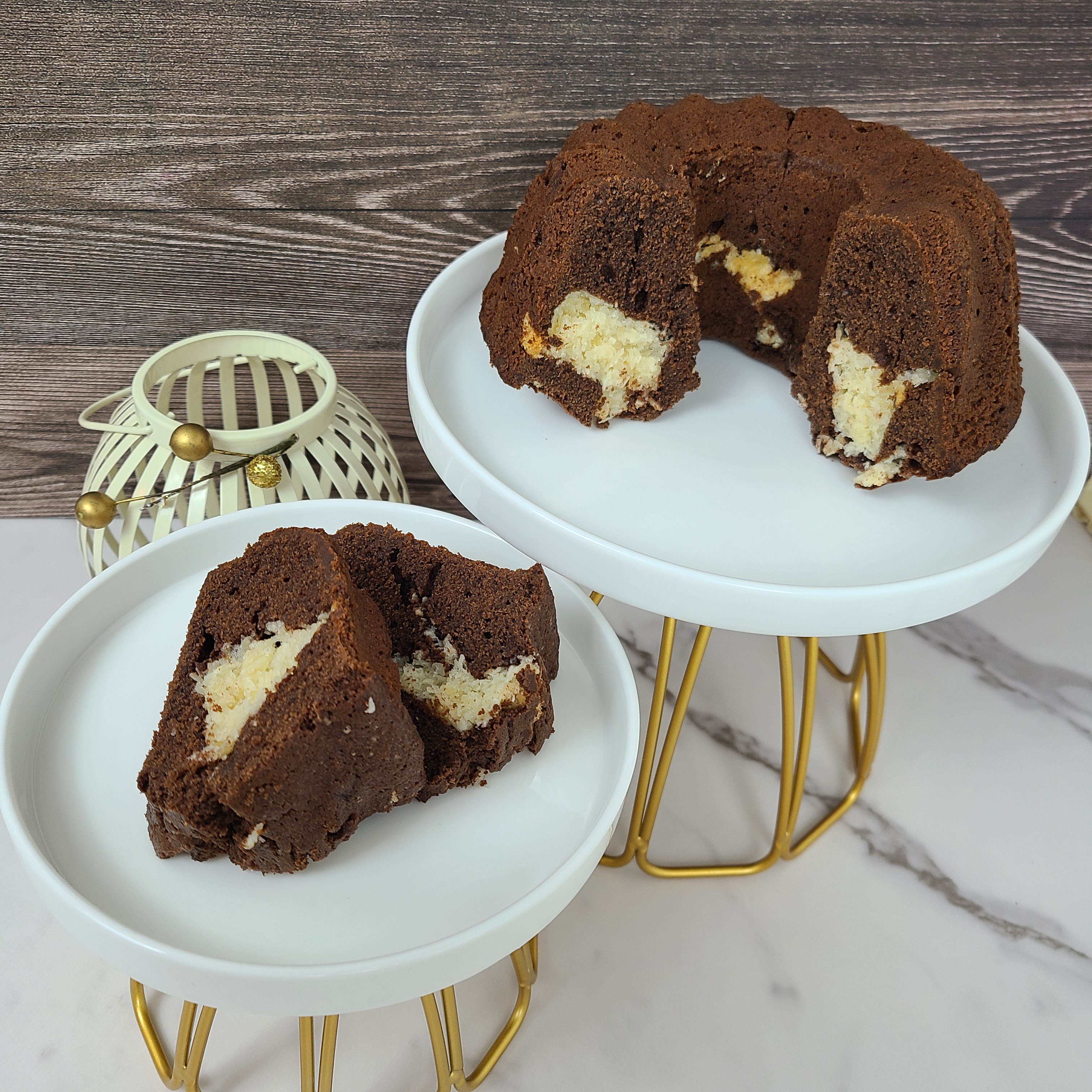 Bounty Cake, named after the German chocolate bar famous in Germany. The cake has a rich dark chocolate flavor an has a moist coconut meringue center. 